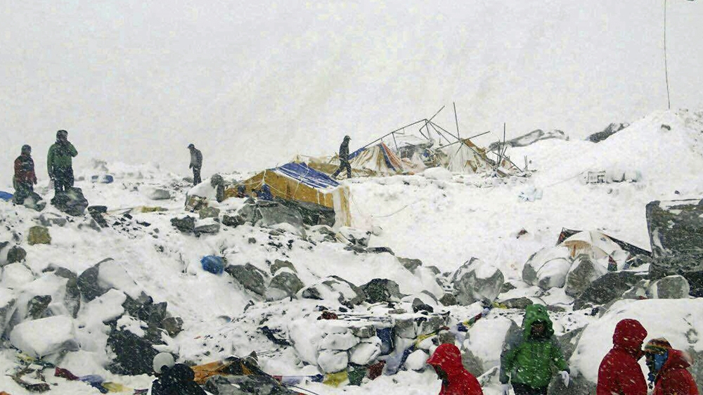 The powerful quake also triggered an avalanche that swept across Everest Base Camp [AzimAfif/AP]
