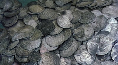 Coins, mainly Byzantine and Islamic, part of Viking treasure found in burials [Getty]
