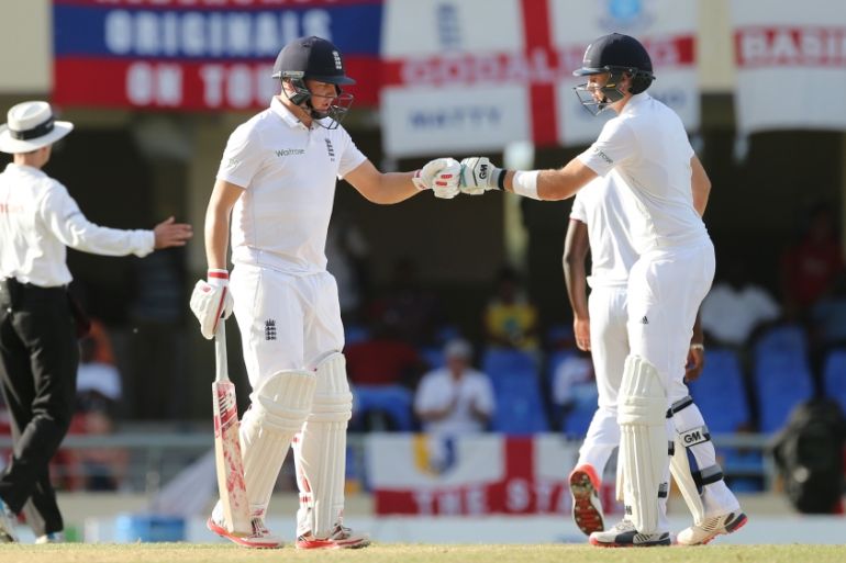 Cricket: England''s Gary Ballance and Joe Root touch gloves after a boundary