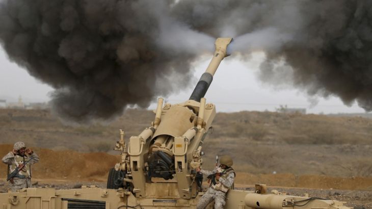 A Saudi artillery unit fires shells towards Houthi positions from the Saudi border with Yemen