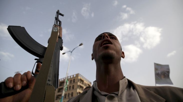 A follower of the Houthi movement shouts slogans during a protest against the Saudi-led air strikes in Sanaa