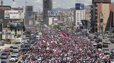 Thousands of Lebanese Armenians march to mark the 100th anniversary of the mass killings [AP] 