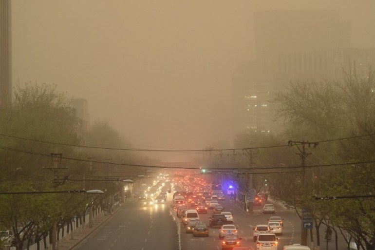 Beijing faces an increasing dust storm [AFP]