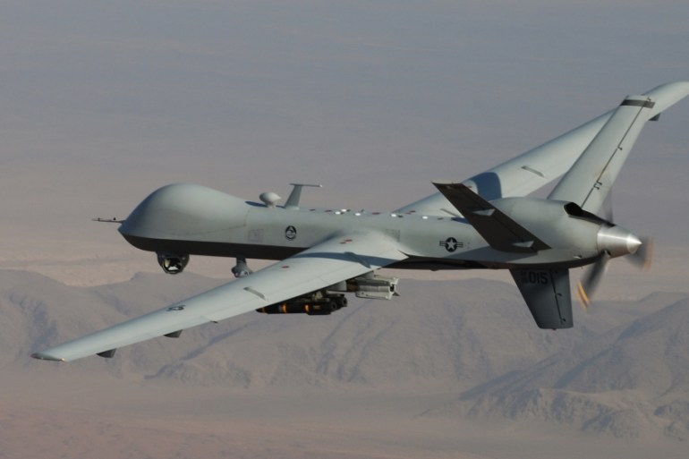 MQ-9 Reaper armed with GBU-12 Paveway II laser guided munitions and AGM-114 Hellfire missiles