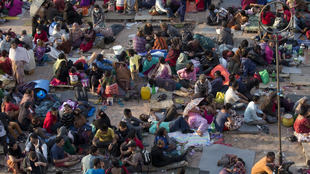Thousands of people, too frightened to venture indoors, are sleeping in the streets of Kathmandu [AP]