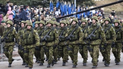 Estonian troops parade in Narva to mark Estonia's Independence Day [AP]    