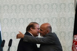 Afghan President Ashraf Ghani embraces Pakistani Prime Minster Nawaz Sharif at the Presidential palace in Kabul [AFP]