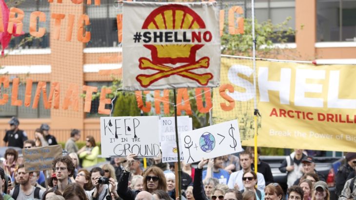 Activists protest the Shell Polar Pioneer oil rig at a rally in Seattle, Washington