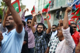 Opposition supporter shout slogans during a protest demanding Maldives President Yameen Abdul Gayoom resign