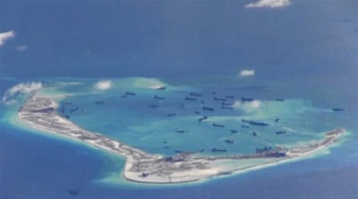 Chinese dredging vessels purportedly seen near the disputed Spratly Islands Reuters]