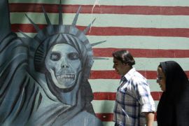 An anti-US mural painting outside the former US embassy in Tehran [AFP]