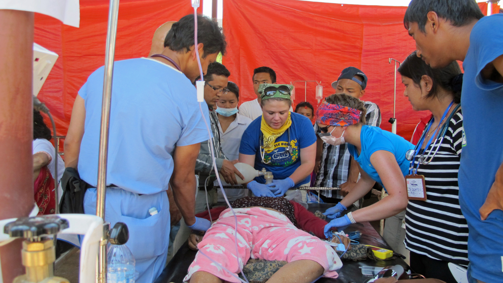 America Nepal Medical Foundation staff unsuccessfully attempt to revive Pasang Lama [Annette Ekin/Al Jazeera]