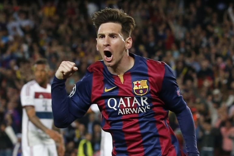 Football: Barcelona''s Lionel Messi celebrates scoring their first goal