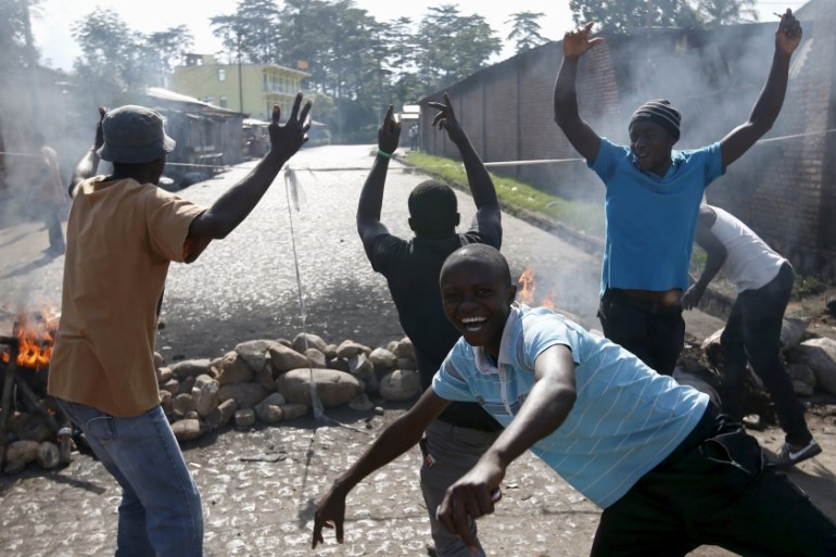 Protesters, who are against President Pierre Nkurunziza''s decision to run for a third term, gesture in front of a barricade in Bujumbura, Burundi [REUTERS]