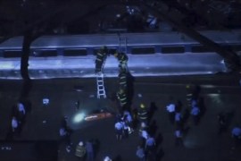 Aerial footage of first responders working at the scene of a train derailment in Philadephia