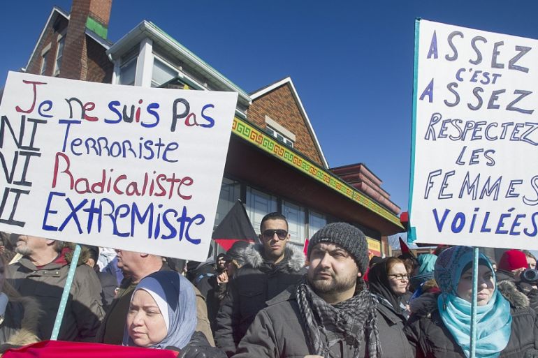Members of the Muslim community attend a demonstration to denounce PEGIDA, an international anti-Islam group, in Montreal [AP]
