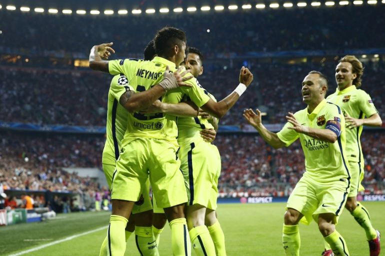 Football: Neymar celebrates with team mates after scoring the first goal for Barcelona