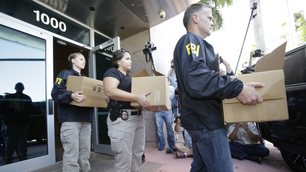 Federal agents carried out boxes of evidence from headquarters of the Confederation of North, Central America and Caribbean Association Football (CONCACAF,) [AP]