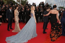 Jury member actress Sienna Miller and jury members pose on the red carpet as they arrive at the closing ceremony of the 68th Cannes Film Festival in Cannes [REUTERS]