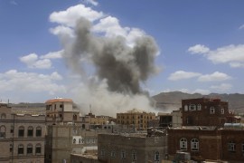 Smoke rises after a Saudi-led airstrike targeted a military base in Sanaa