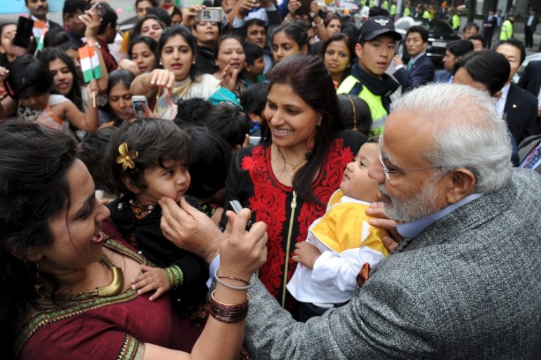 Indian Prime Minister Narendra Modi greets Indian people in central Seoul, South Korea [Reuters]