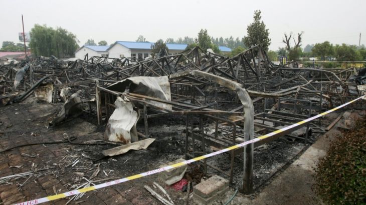 A general view shows the debris after a fire at a rehabilitation centre for elderly in Sanlihe village of Pingdingshan