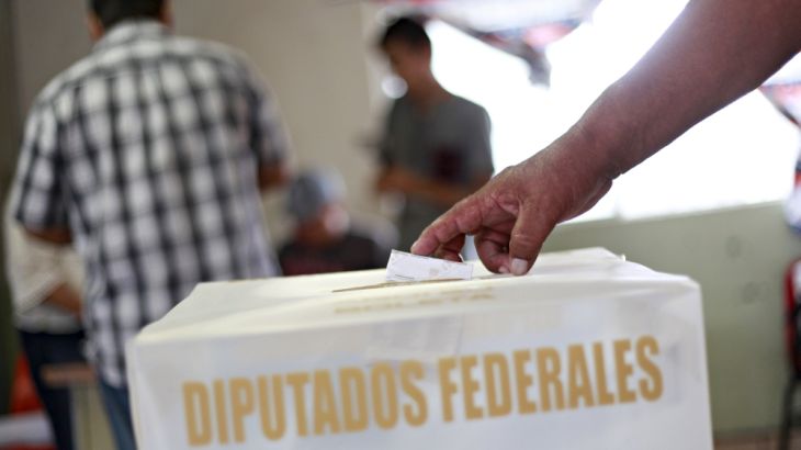 Man casts his ballot at a polling station during mid-term elections in Ciudad Juarez