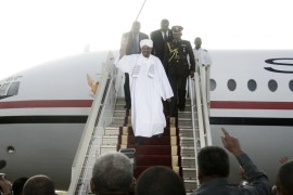 Sudanese President Omar al-Bashir arrives in Khartoum from Johannesburg [AFP]