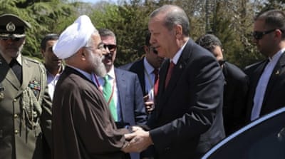 Rouhani greets Erdogan in Tehran [AP] 
