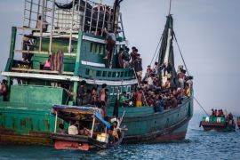 Rohingya migrants on a boat off the coast near Indonesia's East Aceh district of Aceh province before being rescued [AFP]