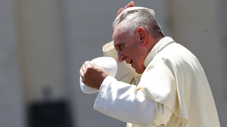 Pope Francis changes skull cap during Wednesday general audience in Saint Peter''s square at the Vatican