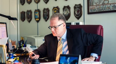 Roberto Di Palma, magistrate on organised crime, in his Reggio Calabria office [Antonella Corigliano/Al Jazeera]