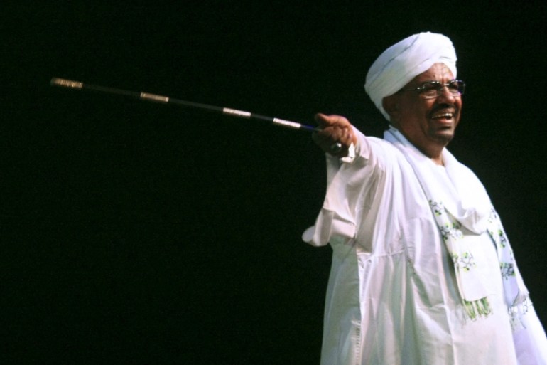 Sudan''s President al-Bashir speaks to the crowd after a swearing-in a ceremony at green square in Khartoum