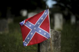 Confederate battle flag marks the graves of soldiers in the Confederate States Army in the U.S. Civil War in Magnolia Cemetery in Charleston