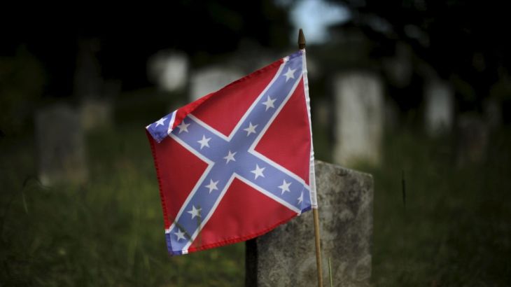 Confederate battle flag marks the graves of soldiers in the Confederate States Army in the U.S. Civil War in Magnolia Cemetery in Charleston