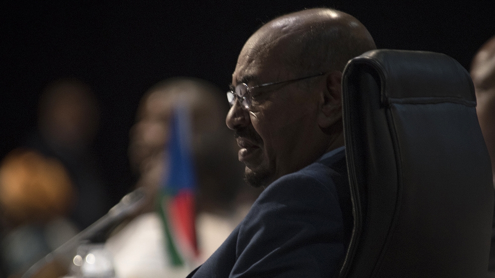 Bashir attended the opening session of the African Union summit in Johannesburg on Sunday [The Associated Press]