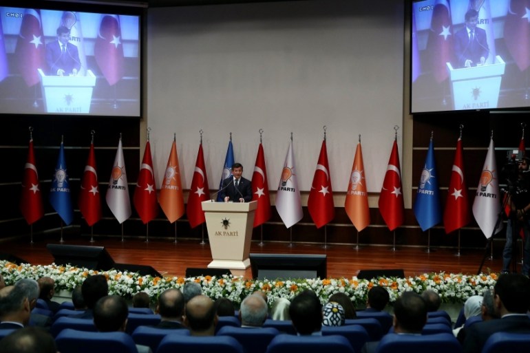 Davutoglu gives a speech during a meeting of the AK party in Ankara, Turkey on June 16 [AFP]