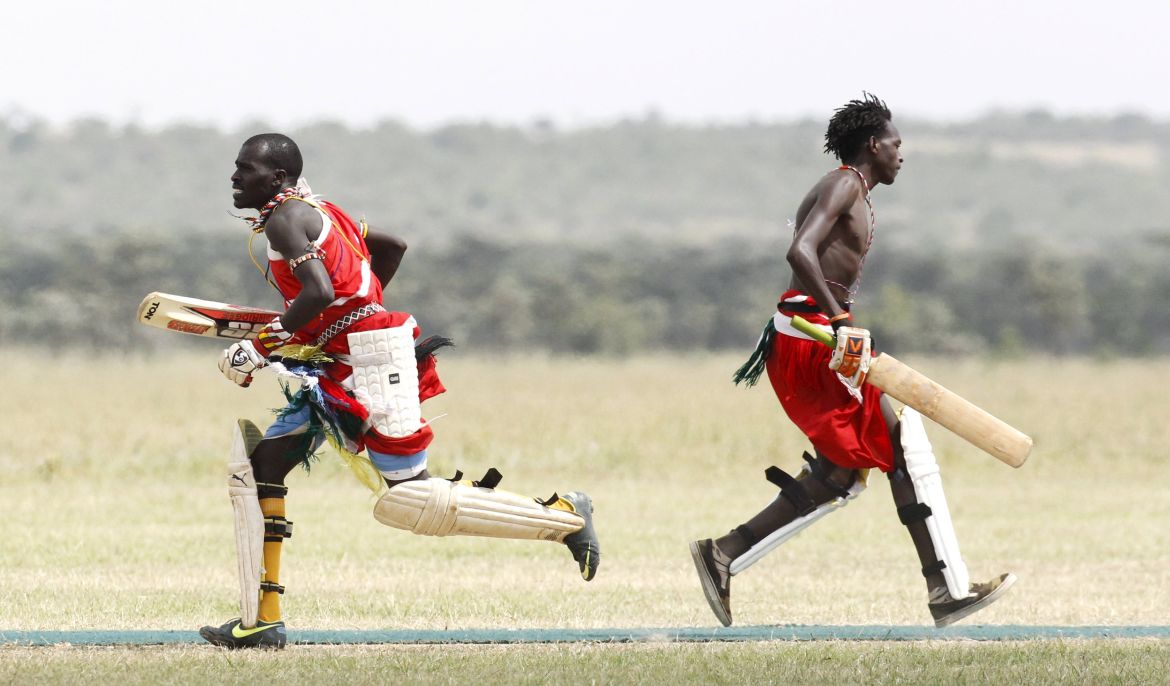 Laimado and Memusi of the Maasai Cricket Warriors run