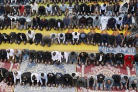 Muslims attend Friday prayers during the second day of Ramadan, in the courtyard of a housing estate next to the small BBC community centre and mosque in east London