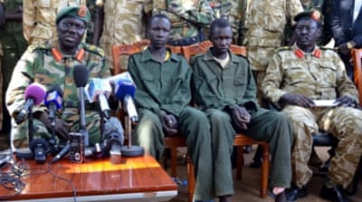 Disarmament ceremony of two child soldiers in South Sudan [Getty]