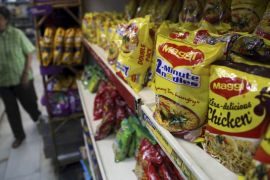 Packaged food with "Maggi" sign on it are displayed at a grocery store in Bangalore, India, Friday, June 5, 2015. India''s Health Ministry announced Friday that Nestle''s po