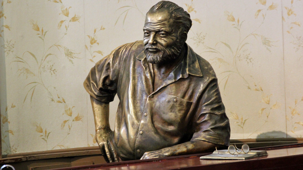 A bronze statue of American writer Ernest Hemingway, who frequented Cuba before the embargo, at Havana's La Floridita bar [Robert Kennedy/Al Jazeera]