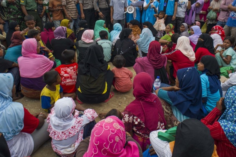 Myanmar Rohingya people at new temporary shelters for Rohingyas in Blang Adoe, North Aceh [AFP]