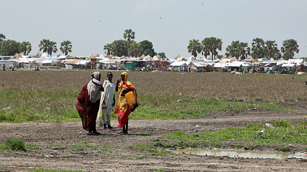 Women near one of Wau Shilluk's markets. Originally a town of less than 5,000, it now shelters more than 35,000 mostly displaced [Simona Foltyn/Al Jazeera] [Al Jazeera]