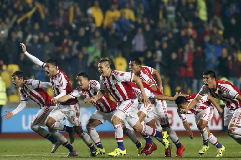 Paraguay players celebrate after defeating Brazil in a penalty shootout in their Copa America 2015 quarter-finals soccer match at Estadio Municipal Alcaldesa Ester Roa Rebolledo in Concepcion