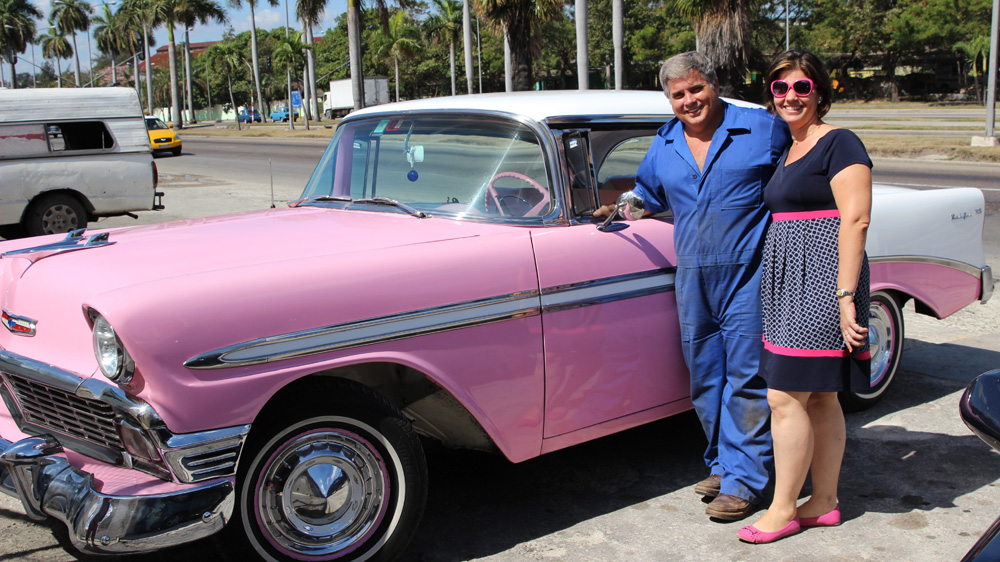 Julio Alvarez and his wife Nidialys Acosta Cabrera opened their car restoration and tour business three years ago [Robert Kennedy/Al Jazeera]