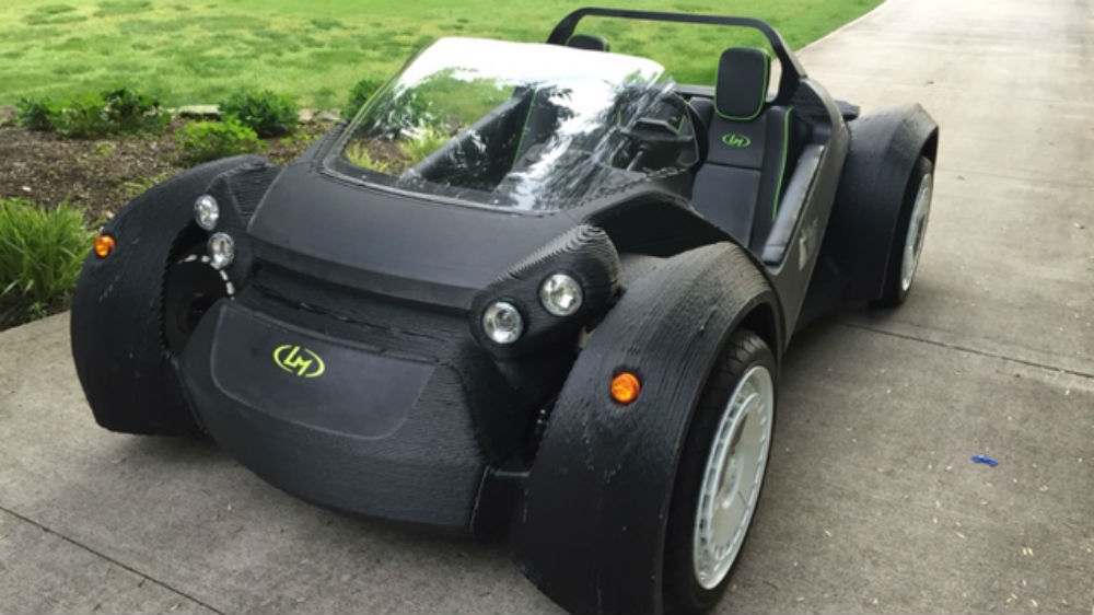Manufacturers of the 3D car say initial models travel at 40 km an hour. [Christopher Sheridan/Al Jazeera] 