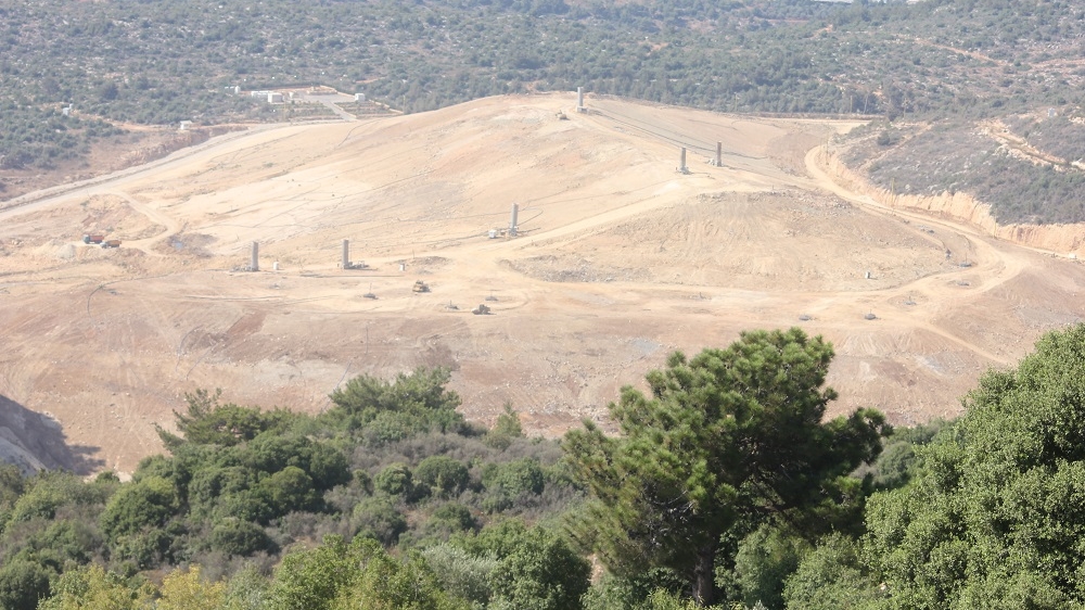 Trees and plant life are stunted near the Naameh-Ayn Drafeel Landfill, and farming is no longer possible [Al Jazeera]