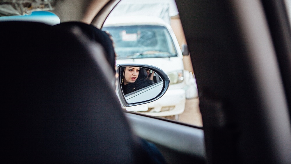 Each mobile team has three members: a male driver, a Yazidi woman, and a Kurdish woman [Andrea DiCenzo/Al Jazeera] 