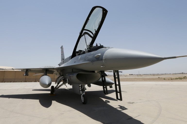 U.S. F-16 fighter jet is seen during an official ceremony to receive four of these aircrafts from the U.S. at the tarmac a military base in Balad